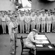 General of the Army Douglas MacArthur signs the Instrument of Surrender on behalf of the Allied Powers (US Navy)
